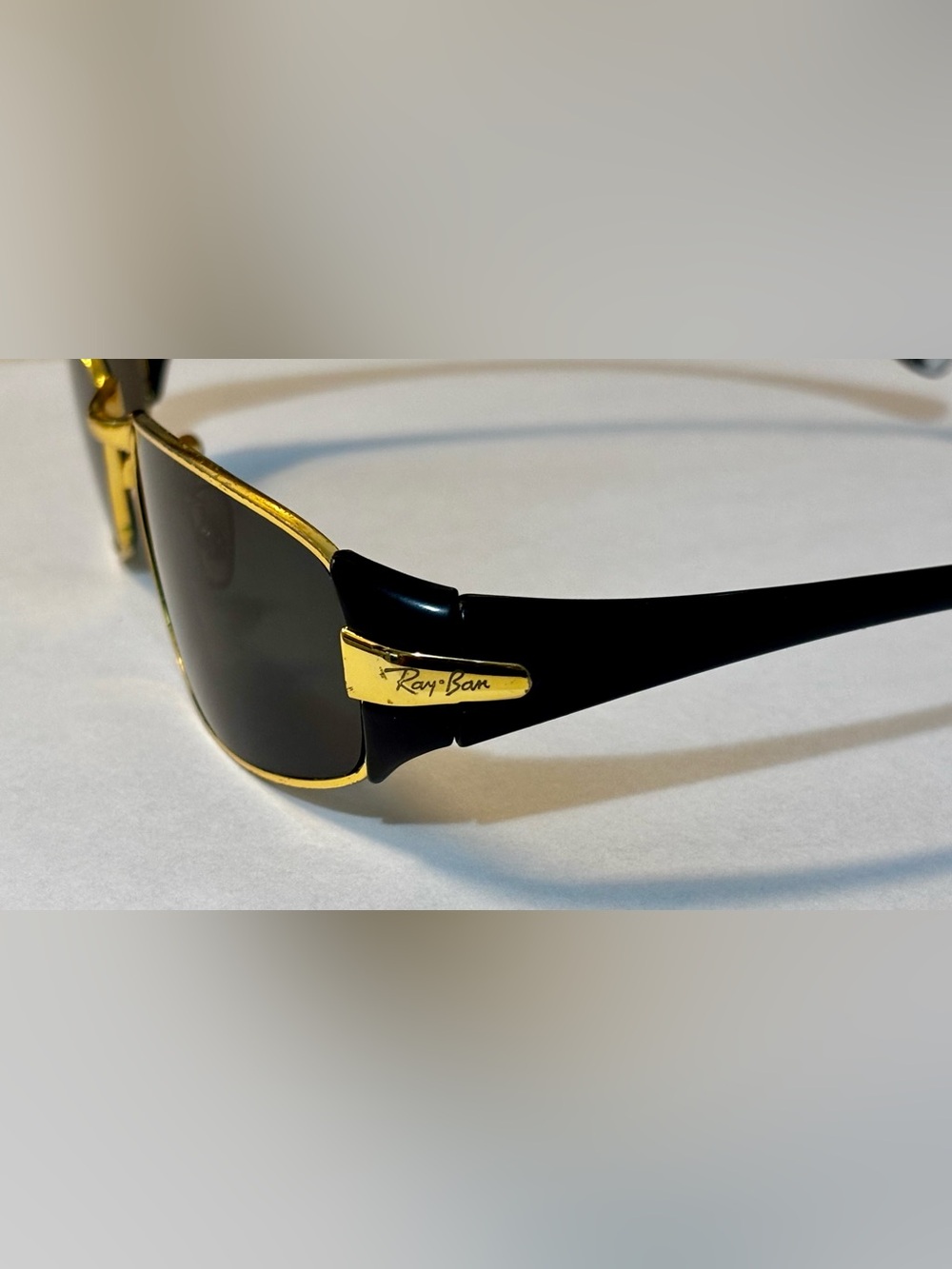 Vintage 2000’s Ray-Ban Men’s Black and Gold Sunglasses - Classic Temple Accent